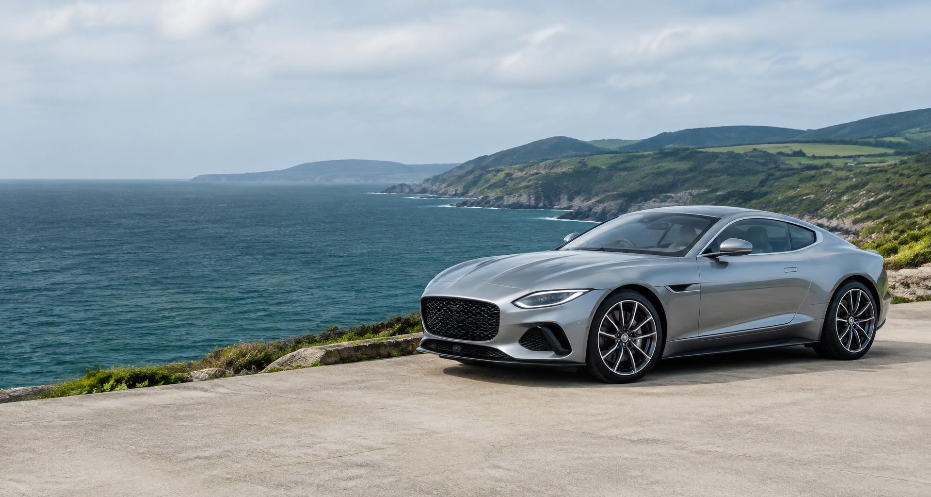 Silver coupe overlooking the coast
